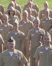 ROTC cadets stand at attention