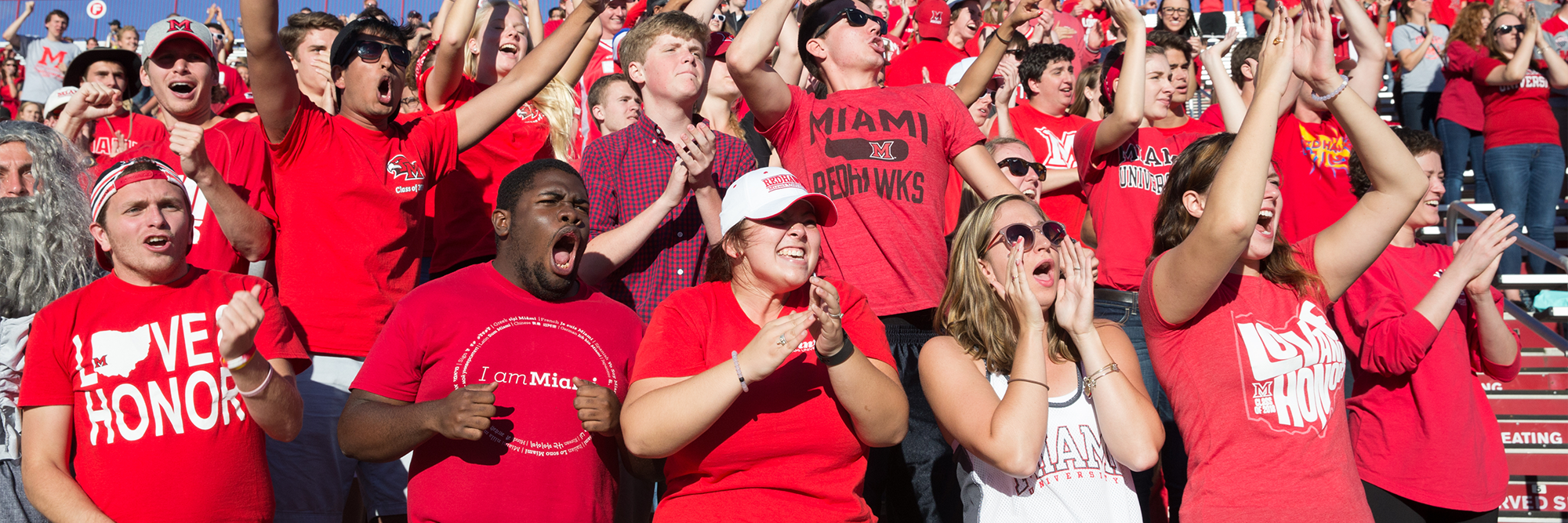Students cheer on the Redhawks during a sporting event at Miami University.