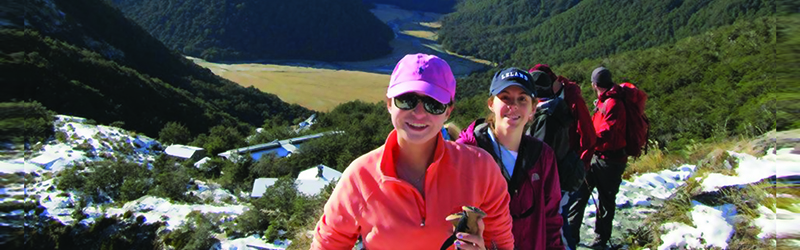A group of Miami students hiking up mountains on a study abroad trip