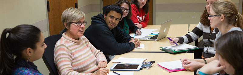 A group of Miami students having a round table discussion