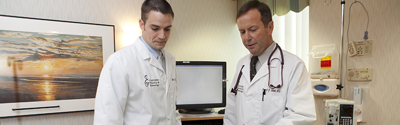 Student interns with a doctor