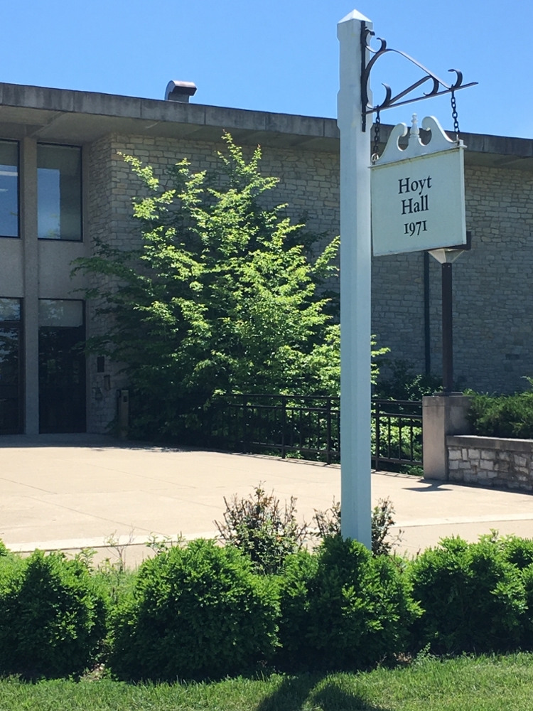 Hoyt Hall front sign with the building in the background