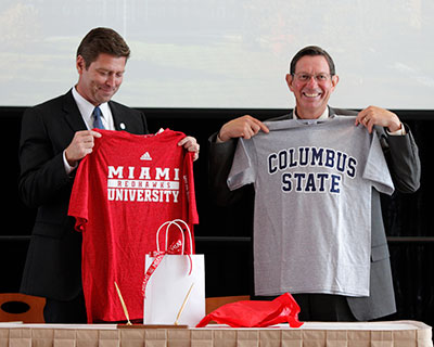 Columbus State President David Harrison (left) and Miami President David Hodge