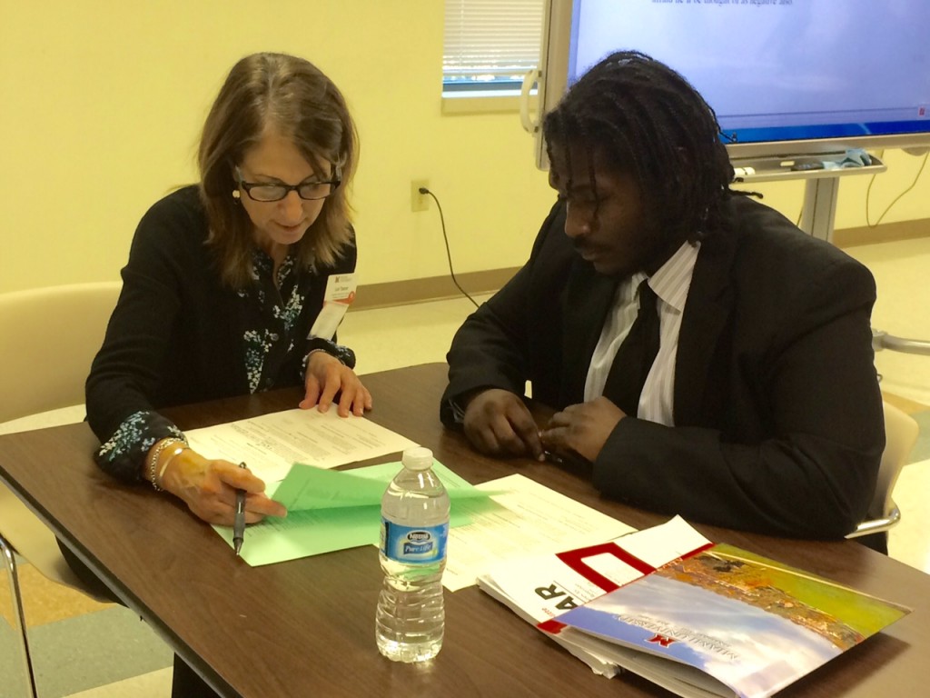 Miami career services staff member works with Urban League client