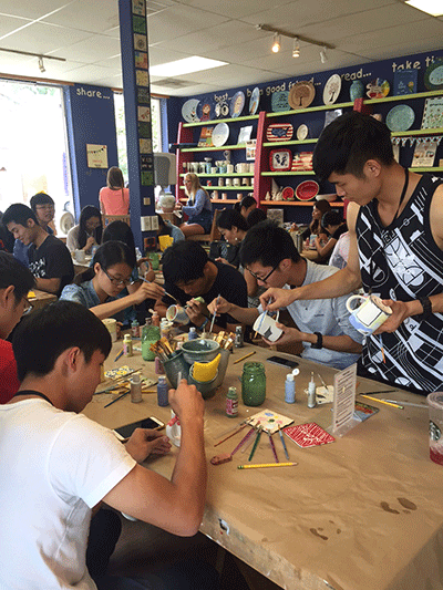 Students from China learn the art of pottery making.