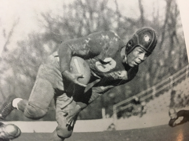 Jerry Williams catches a football.