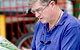 Man studying a guide