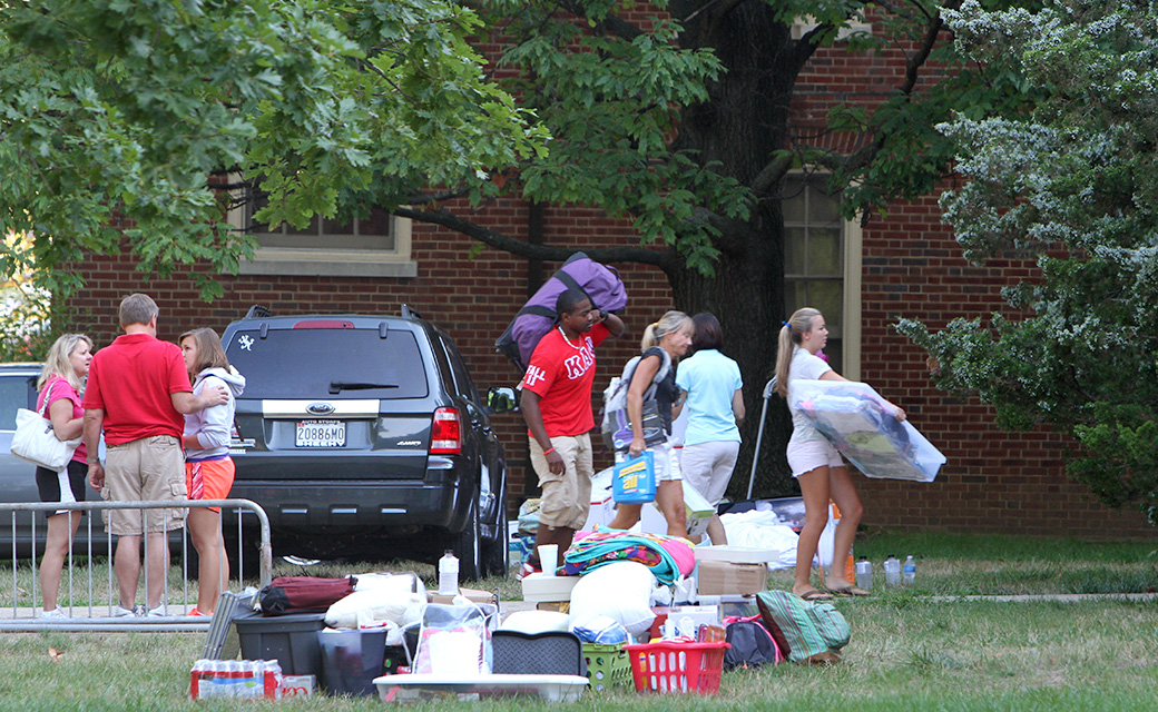 Move-in day is well orchestrated and first year students get help hauling their belongings to their new home away from home.