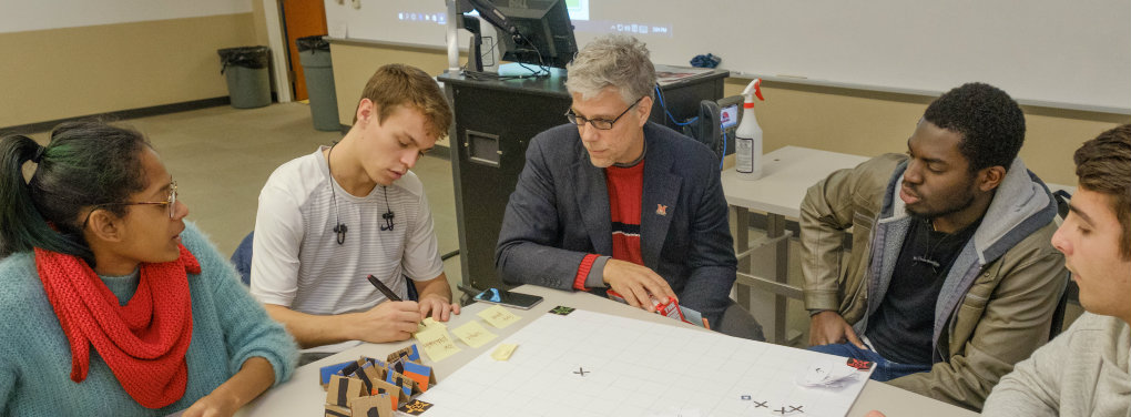 CEC's Michael Bailey-Van Kuren with students