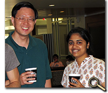enlarged photo of faculty, staff, and students socializing