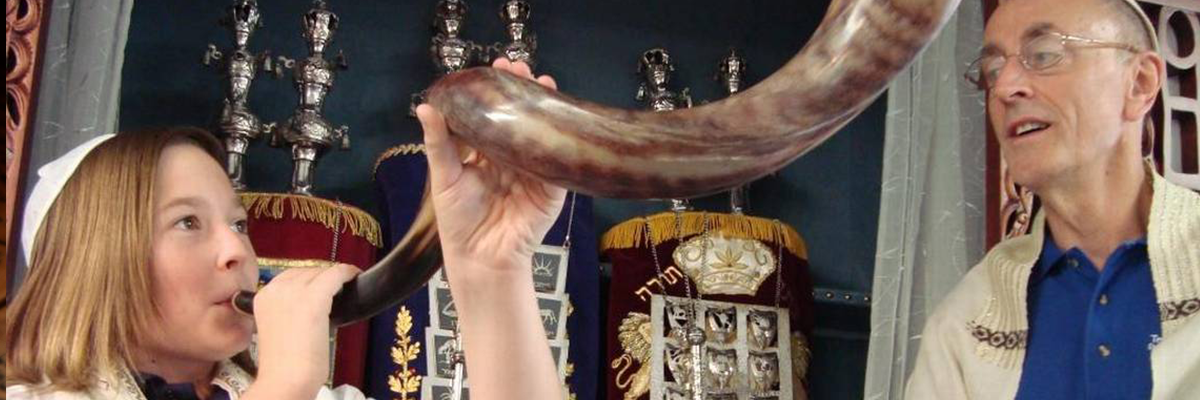 Rabbi Blowing a Shofar