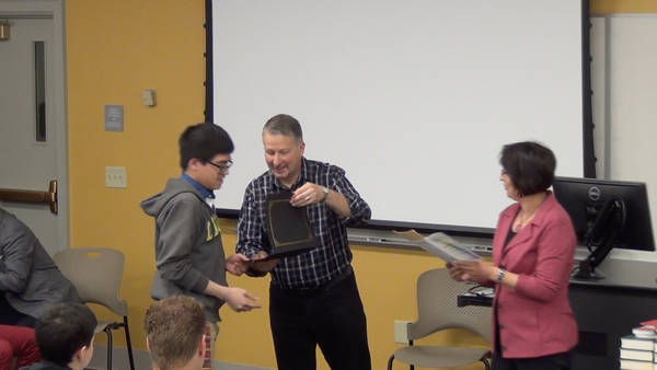 Students receive the Outstanding Student Awards