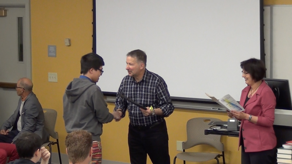 Students receive the Outstanding Student Awards