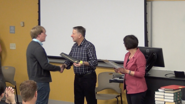 Students receive the Outstanding Student Awards