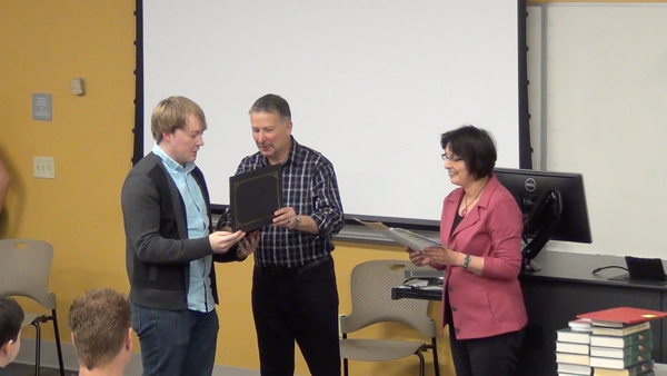 Students receive the Outstanding Student Awards