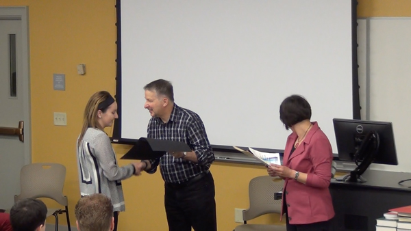 Students receive the Outstanding Student Awards
