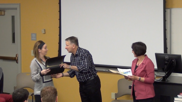 Students receive the Outstanding Student Awards
