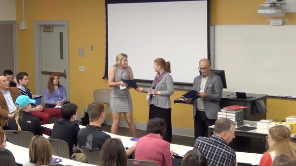 Students receive the Outstanding Student Awards