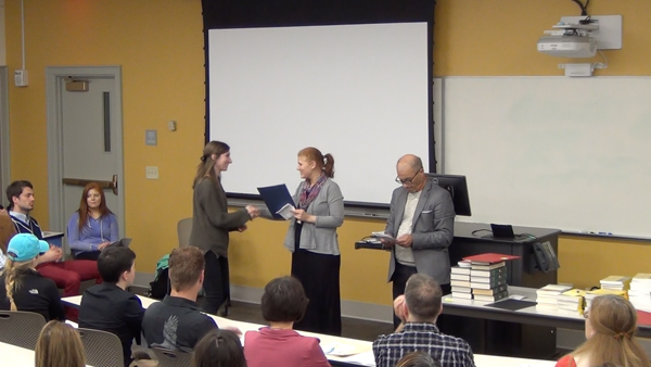Students receive the Outstanding Student Awards