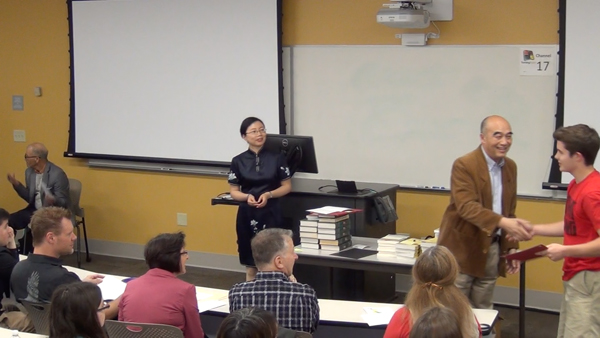Students receive the Outstanding Student Awards
