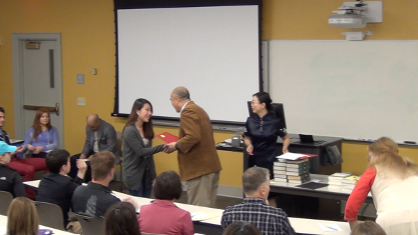 Students receive the Outstanding Student Awards