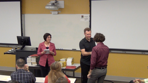 Students receive the Outstanding Student Awards