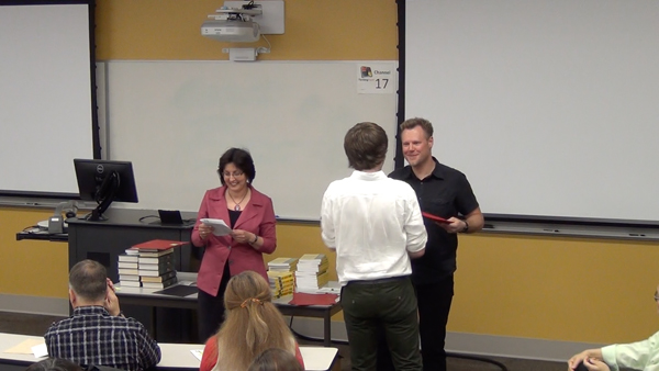 Students receive the Outstanding Student Awards