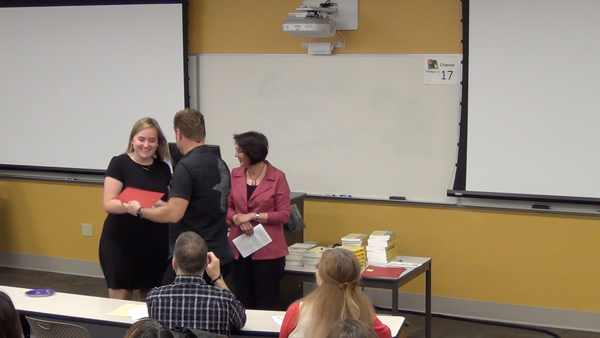 Students receive the Outstanding Student Awards