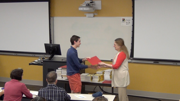 Students receive the Outstanding Student Awards