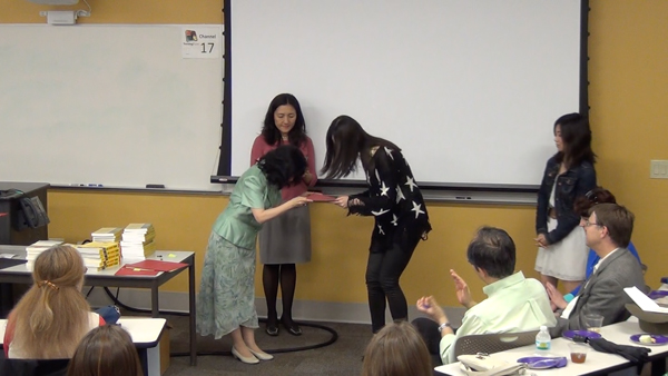 Students receive the Outstanding Student Awards