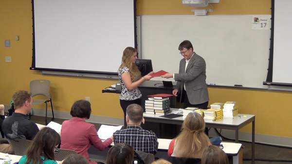 Students receive the Outstanding Student Awards