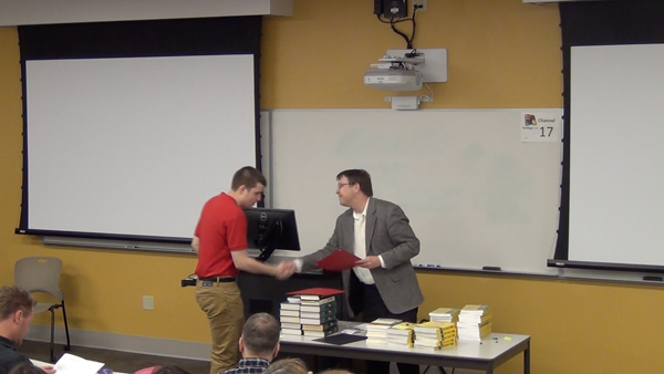 Students receive the Outstanding Student Awards