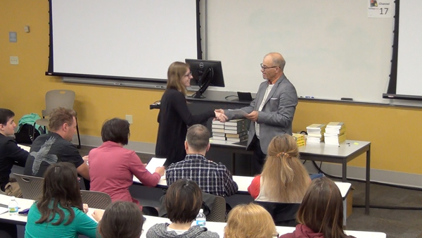 Students receive the Outstanding Student Awards