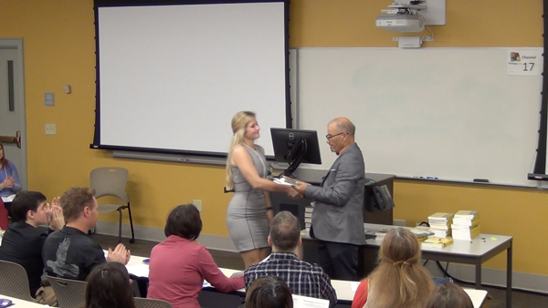 Students receive the Outstanding Student Awards