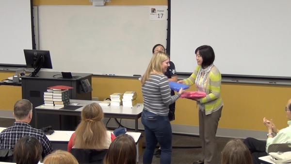 Students receive the Outstanding Student Awards