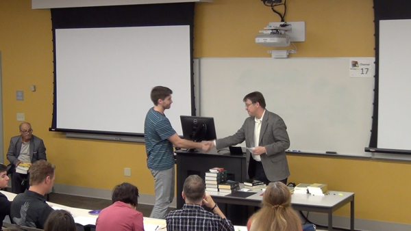 Students receive the Outstanding Student Awards