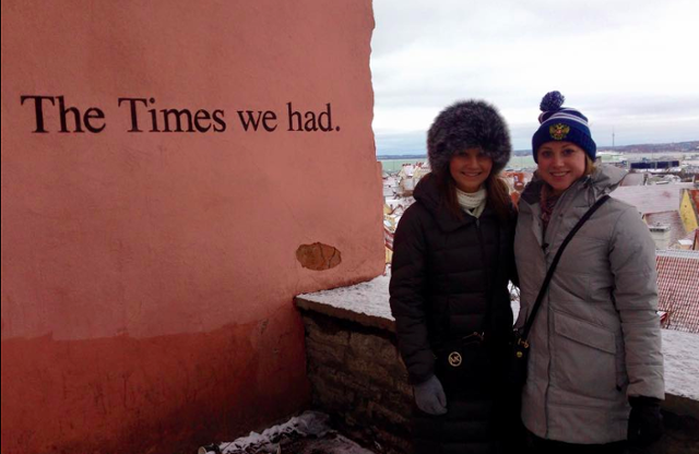 Students in front of sign -- The Times We Had