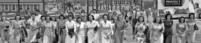 women at factory shift change