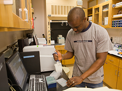 A postdoctoral fellow conducts research in the CBFG.