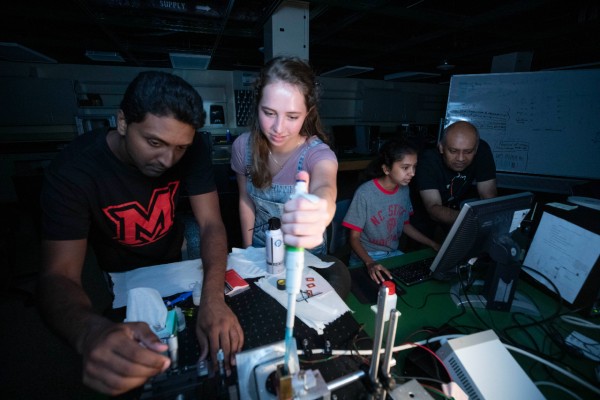 students in physics lab