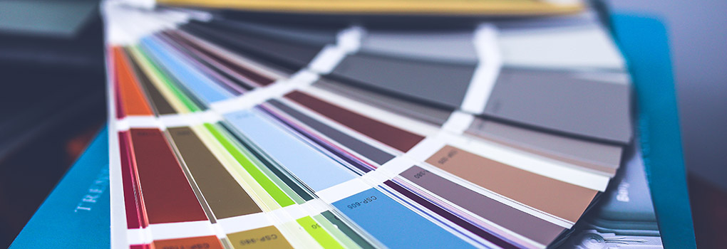 a Pantone book of color swatches is fanned out