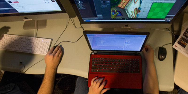 students using software as part of Interactive Media Studies
