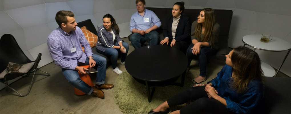 Students converse at a networking event in San Francisco