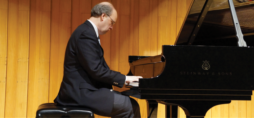 Bruce Murray performing on piano