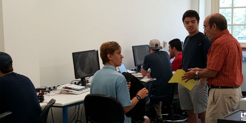 group of students working in an electrical engineering lab