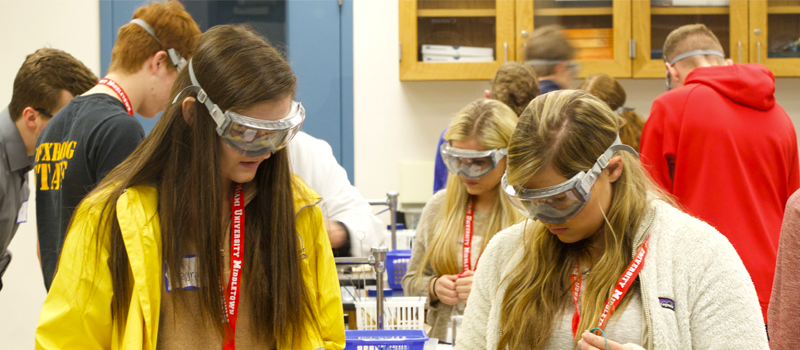 two students in chemistry education class