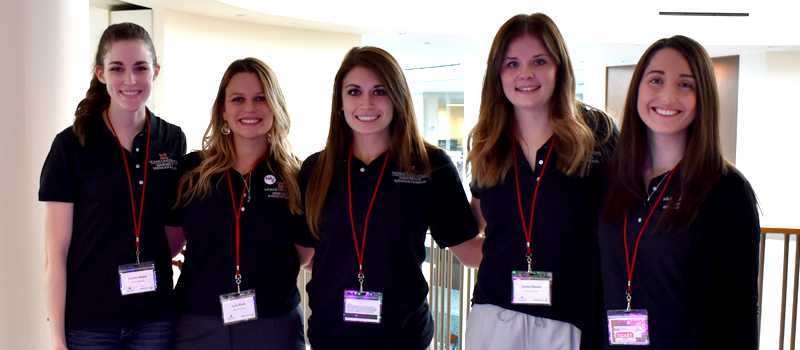 group of slam students take a picture in the Armstrong Student Center