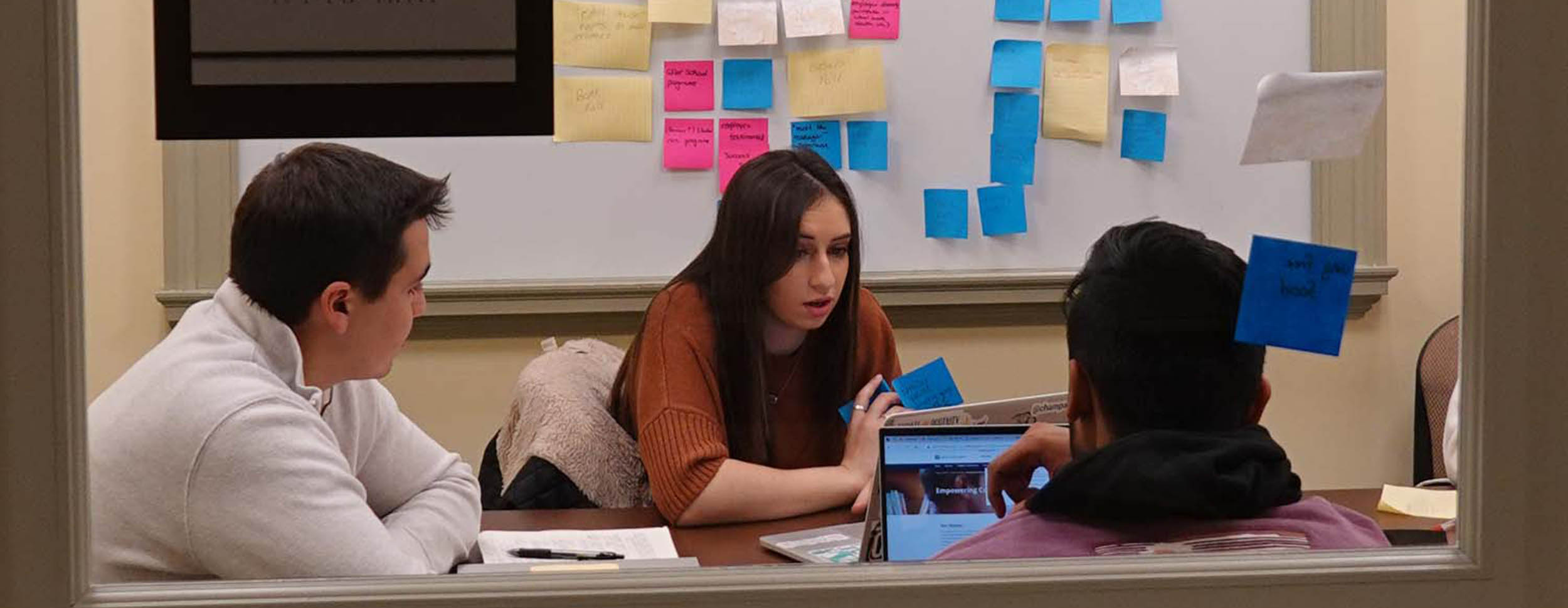 FYIC students work in a lower level study room