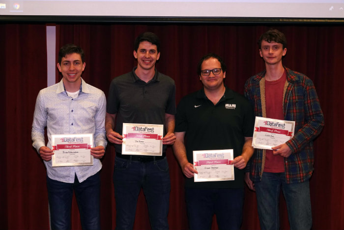 DataFest winners holding awards