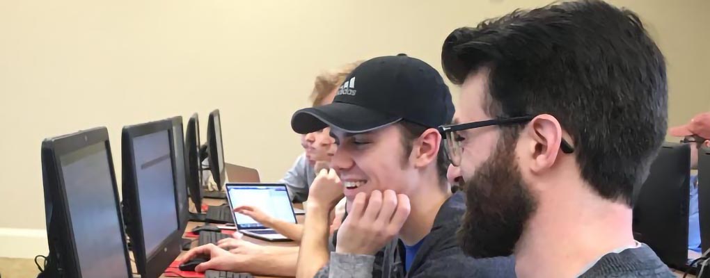 Students work in a data mining class